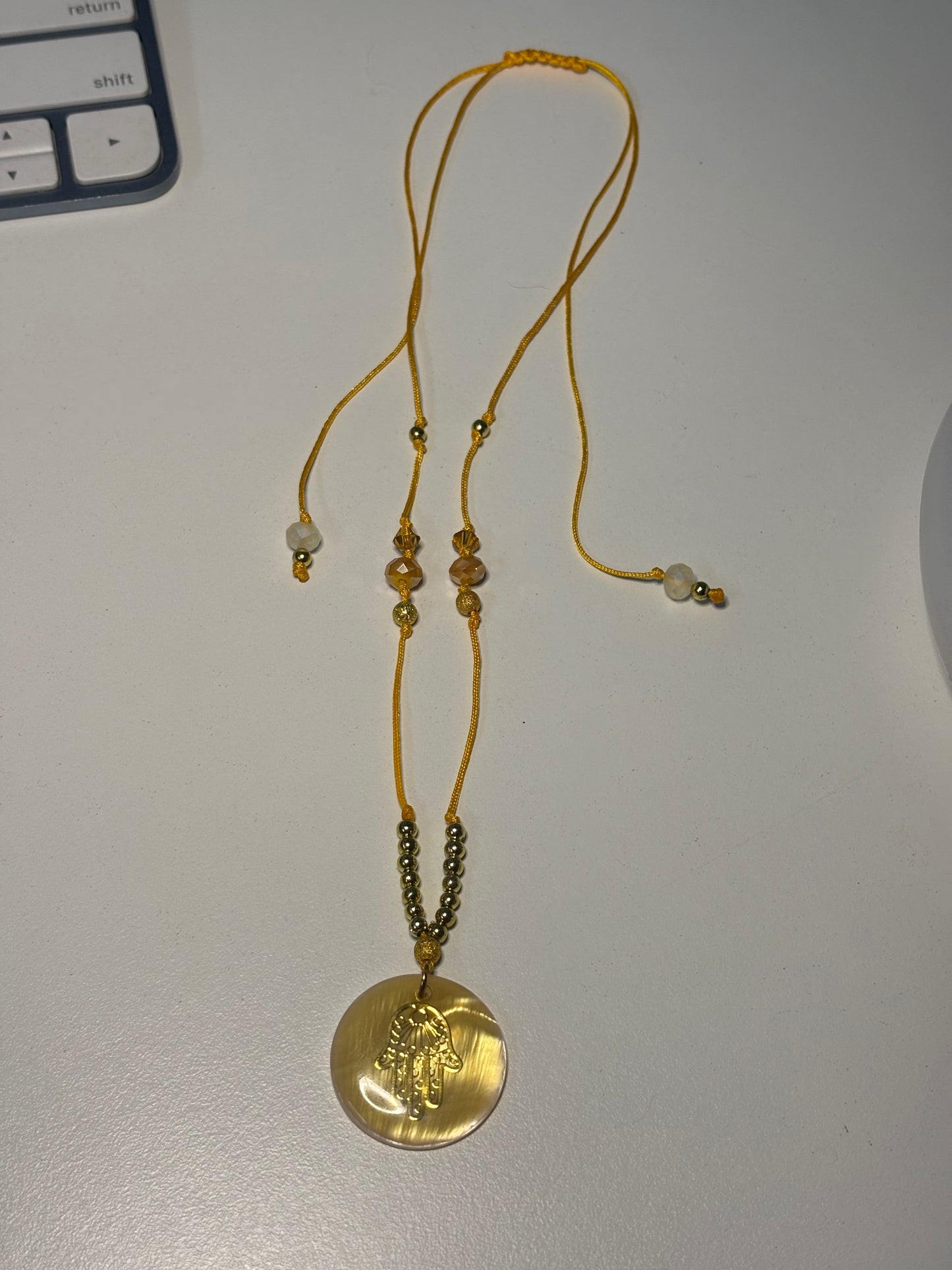 Hamsa hand necklace and earrings